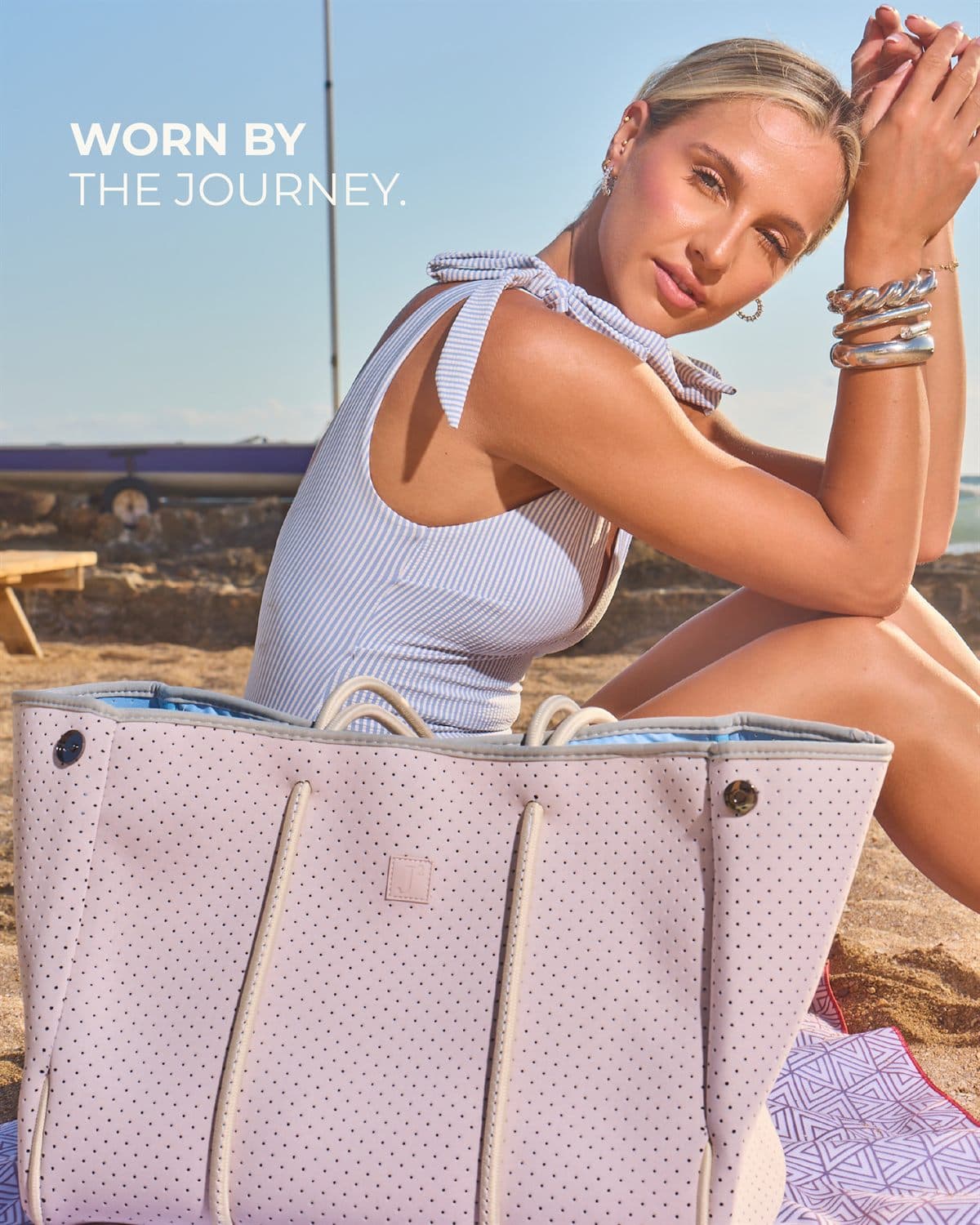 Worn by the journey — the Blush tote by the shore