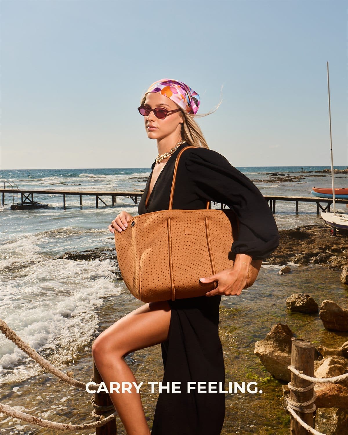 Carry the feeling — the Camel tote crossing the rocks